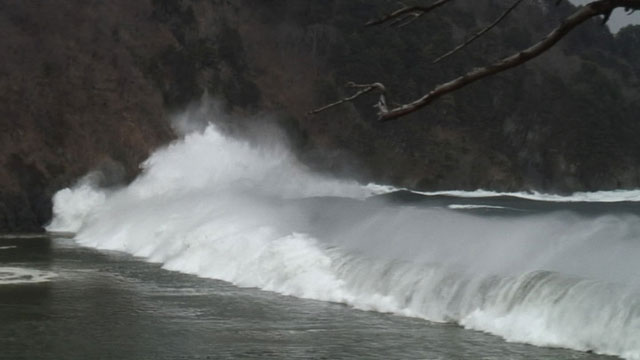Powerful tsunami wave approaching the Sanriku coast during the 2011 Japan earthquake and tsunami    :provided by Earthquake Memorial Museum