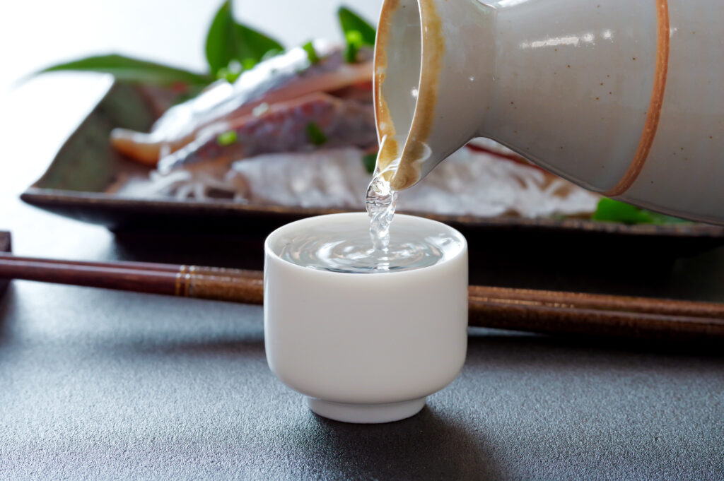 Japanese sake being pored