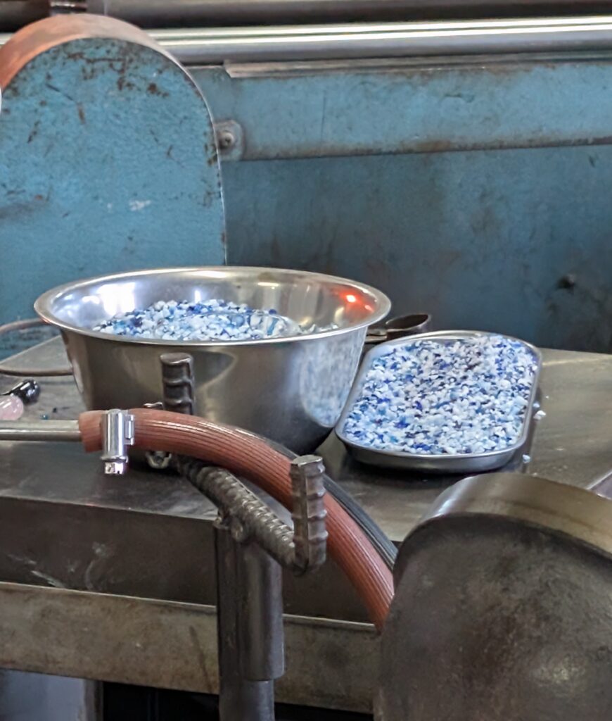 Blue and white glass chips prepared for creating Tsugaru Vidro patterns
