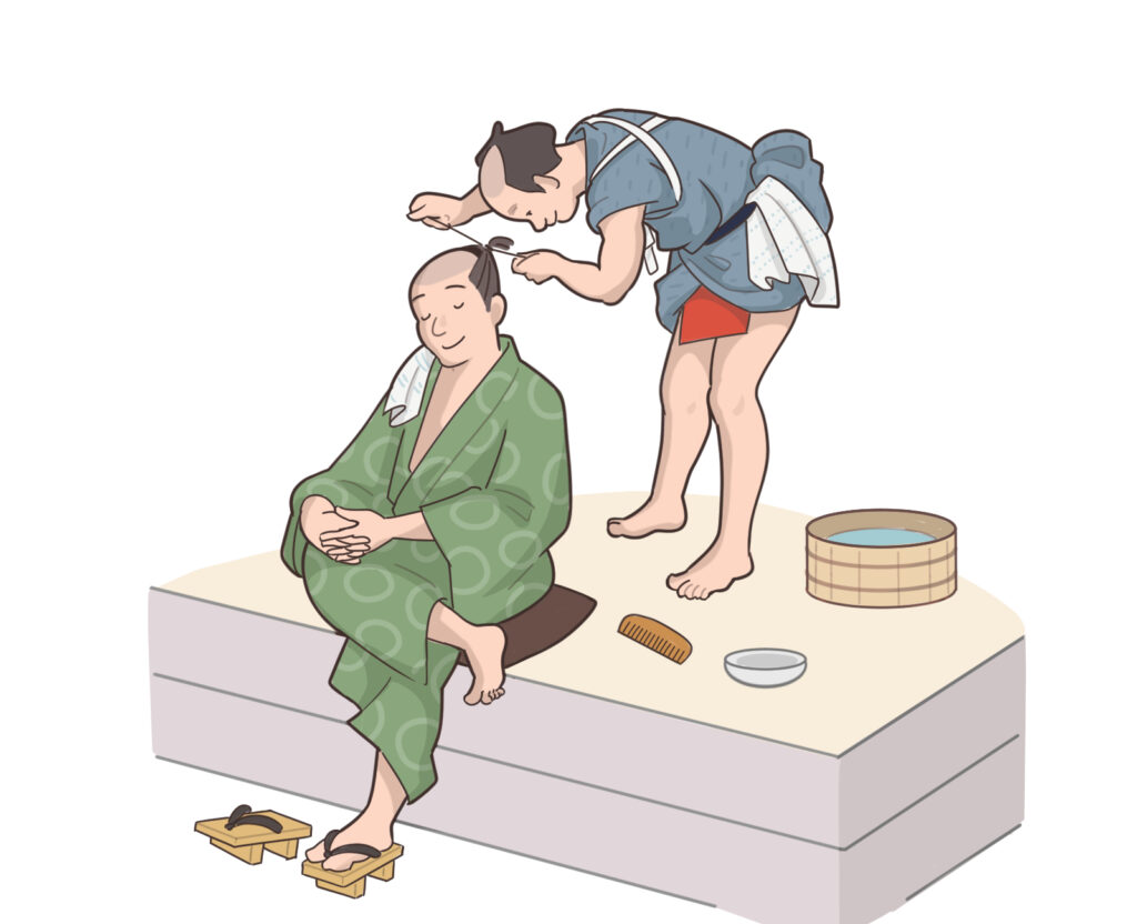 Traditional Japanese kamiyui arranging a man’s topknot during the Edo period